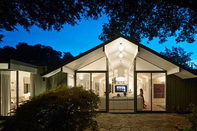 Mid-century modern one-story glass gable roof idea in San Francisco
