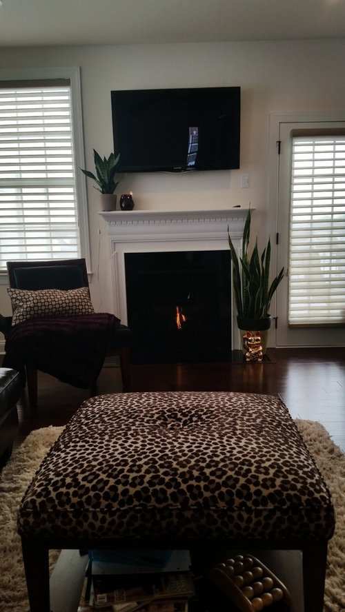 Black wallpaper behind fireplace?