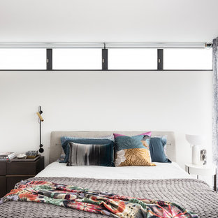 Inspiration for a contemporary guest bedroom in Sydney with white walls, carpet and grey floor.