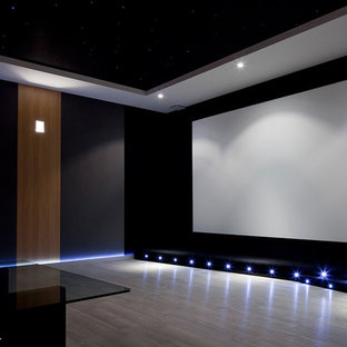 Inspiration for a modern home theater remodel in Lyon