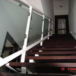 Steel stairs with glass panel - Products