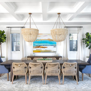 На фото: гостиная-столовая среднего размера в морском стиле с белыми стенами, паркетным полом среднего тона и серым полом без камина с