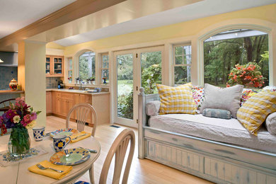Eat-in kitchen - transitional l-shaped light wood floor eat-in kitchen idea in Bridgeport with shaker cabinets, light wood cabinets and an island