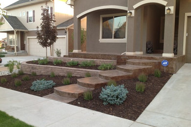 Inspiration for a mid-sized transitional landscaping in Denver.