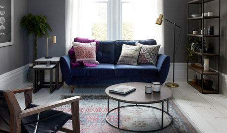 9 Ways to Work Your Room Around a Blue Sofa