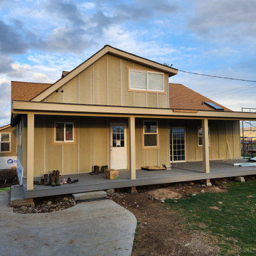 100 year old home face lift remodel covered porch board and batton siding
