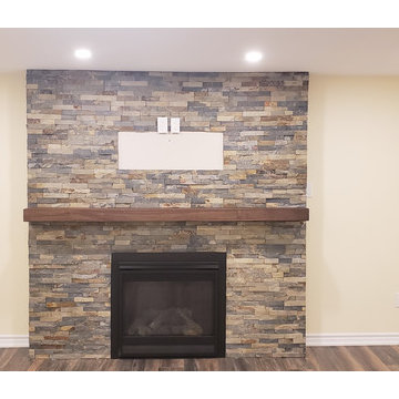 Family Room with a Grand Fireplace.