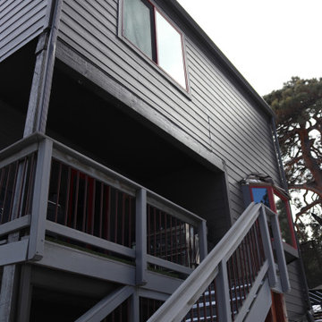 Dark Exterior Remodel | James Hardie Siding with Stone Accents