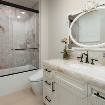 Secondary Bathroom with Onyx Slab Shower Walls & Matching Vanity – Newport Coast