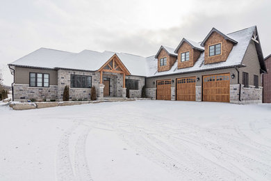 Inspiration for a craftsman brown mixed siding exterior home remodel in Toronto