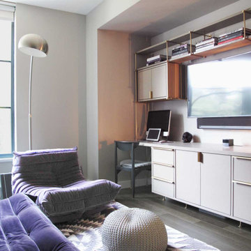 Home office with custom cabinets and brass rods
