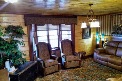 Family room - rustic family room idea in Other