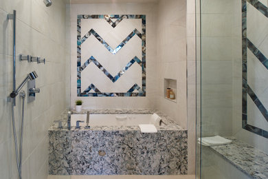 Shower bench - large modern master beige tile and porcelain tile porcelain tile, beige floor and double-sink shower bench idea in Denver with shaker cabinets, medium tone wood cabinets, an undermount tub, gray walls, an undermount sink, quartz countertops, a hinged shower door and a built-in vanity