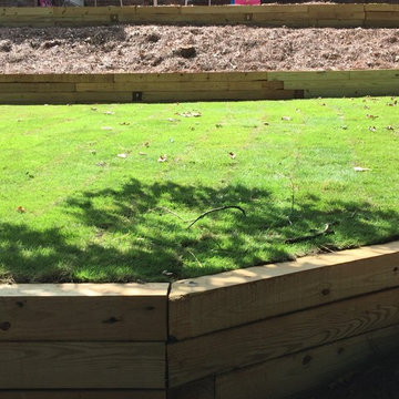 3 Tier PT Timber Walls, PT Timber Steps, Paver Patio, Irrigation, Sod, Drainage