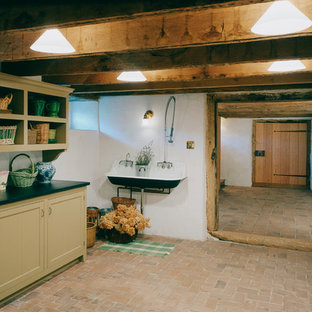 Design ideas for a medium sized classic fully buried basement in Richmond with white walls and brick flooring.