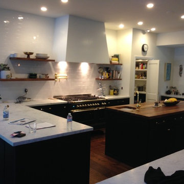 custom kitchen with butcher block island