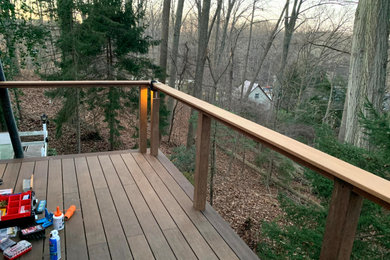Deck - small craftsman backyard second story cable railing deck idea in Philadelphia with no cover
