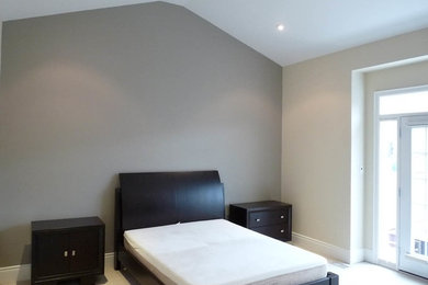 Example of a trendy bedroom design in Toronto