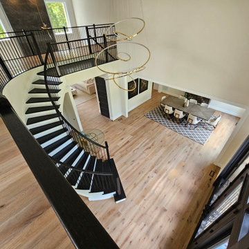 Project #130 | Curved Staircase with Wraparound Balcony