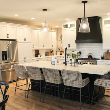 White, Black, and White Oak Open Concept Kitchen and Pantry in Bettendorf Iowa