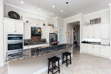 Example of a transitional kitchen design in Orlando