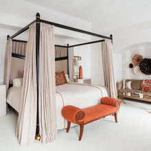 pop of color in bench at end of bed