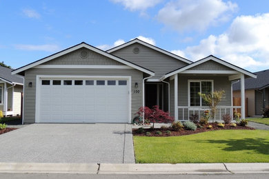 Inspiration for a mid-sized contemporary gray one-story concrete fiberboard house exterior remodel in Seattle