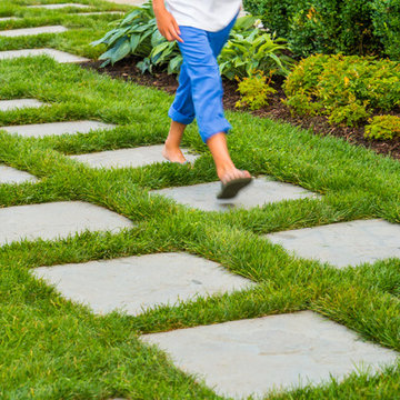 Entertain in this Backyard Landscape with Patio & Firepit: Perfect for Families!