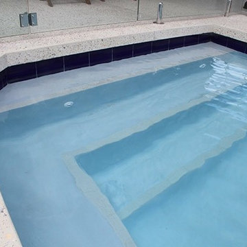 DS Grinding Services: Honed Concrete with infinity pool surround