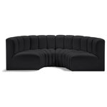 Meridian Furniture - Arc Vegan Leather Upholstered 4-Pc. Inward Curved Modular Sectional, Black - Unleash modern opulence with the Arc Vegan Leather 4pc. Sectional. Crafted for the modern connoisseur, this Sectional injects an air of refined luxury into any space. Its sleek silhouette, upholstered in supple black vegan leather, exudes timeless sophistication while the deep channel tufting adds textural intrigue, further elevating the chair's visual appeal. The modular design makes it a versatile chameleon, effortlessly adapting to your evolving needs and preferences. Whether you envision it gracing a chic living room corner, basking in the glow of a bedroom window, or adding a touch of drama to a home office, the Arc seamlessly complements your unique interior aesthetic.