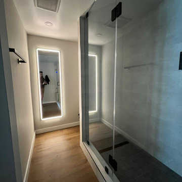 Bathroom Passage with Full-Length LED Mirror and Glass Shower - Encinitas