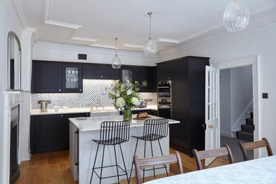 Photo of a kitchen/diner in Devon with an island.