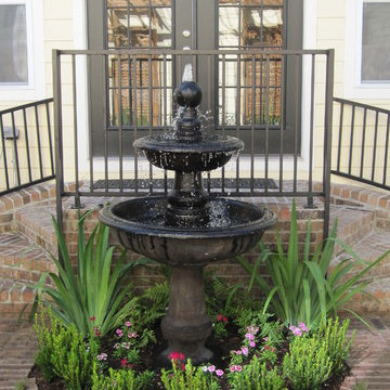 Beautiful brick paths, patio and tiered fountain!