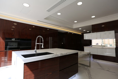 Inspiration for a transitional kitchen remodel in Other with an island