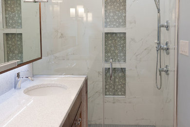 Inspiration for a mid-sized contemporary master bathroom in Chicago with recessed-panel cabinets, medium wood cabinets, an alcove shower, gray tile, white tile, marble, grey walls, marble floors, an undermount sink, quartzite benchtops, white floor and a hinged shower door.