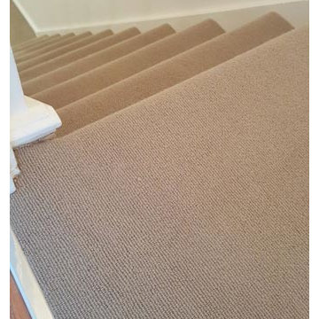 Brown Carpet Installation to Stairs