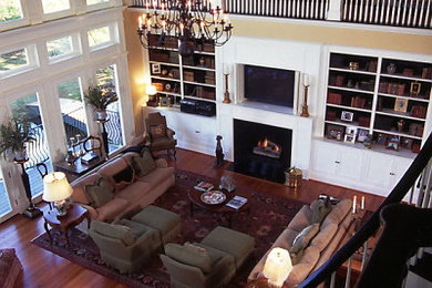 Example of a classic family room design in Other