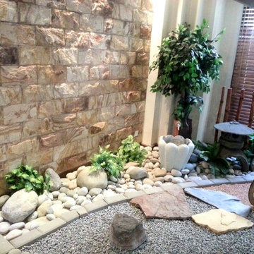 Mrs. Sajjid (under the stairs (zen garden)