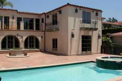 Example of a tuscan home design design in Los Angeles