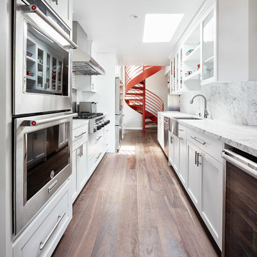 Great Highway Kitchen with spiral stair beyond
