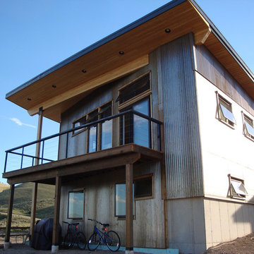 Crimson Bluffs Home- Custom Designed & Fabricated Awnings and Railing