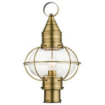 Livex Lighting - Antique Brass Nautical, Farmhouse, Bohemian, Colonial, Outdoor Post Top Lantern - The Newburyport outdoor large single-light post top lantern boasts classic nautical and railway styling. This piece features a beautiful hand-blown clear glass globe and an antique brass finish over the hand crafted solid brass construction. With its easy installation and low upkeep requirements, this light will not disappoint.