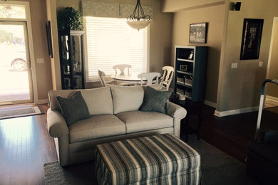Example of a cottage home design design in Little Rock