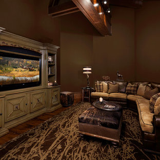 Home theater - rustic home theater idea in Burlington