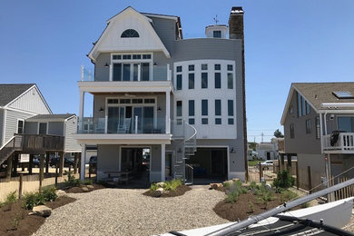 Beach style exterior home photo in Other