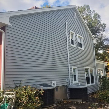 Replacing Old Wood Siding with Pebble Grey GlobalTech 1/2 Inch Insulated Vinyl S