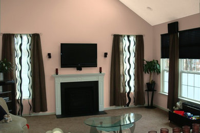 Example of an eclectic family room design in Milwaukee