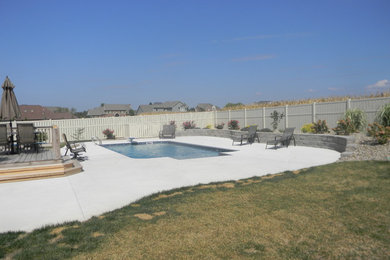 Mid-sized elegant backyard rectangular hot tub photo in DC Metro