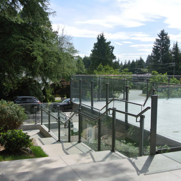 New front entry sequence & garage top patio.