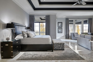 Large transitional guest porcelain tile, multicolored floor and tray ceiling bedroom photo in Toronto with gray walls